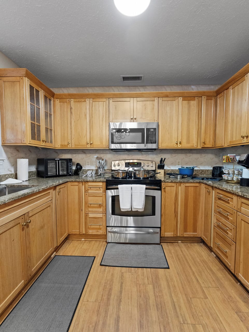 Premium appliances, cabinets, and upgraded cabinets with extra storage space