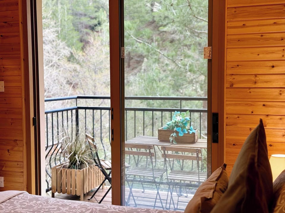 Step outside your room onto your private balcony and enjoy your morning coffee with peaceful, leafy views. 