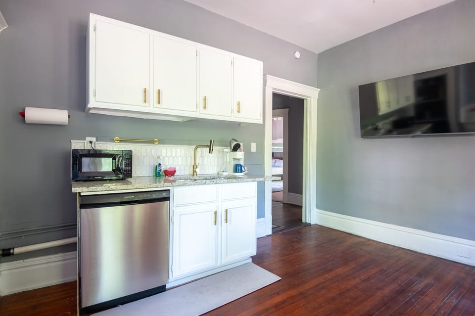 The kitchen comes with a full-size dishwasher and ample storage.
