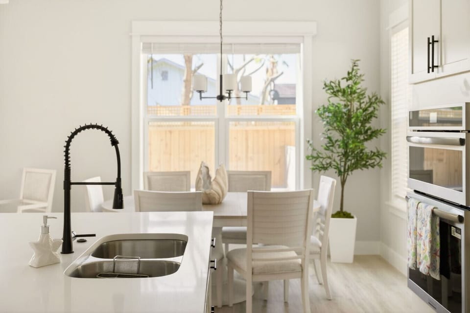 A thoughtfully stocked kitchen with plenty of space to prep, cook, and enjoy meals together 🍳  Option 4: