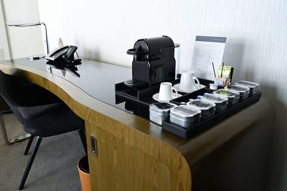 Start your morning with espresso at the sleek desk.