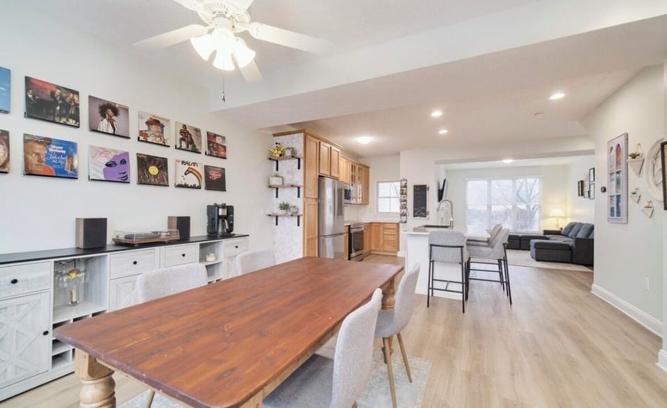 Dining room that leads to a balcony with marina views