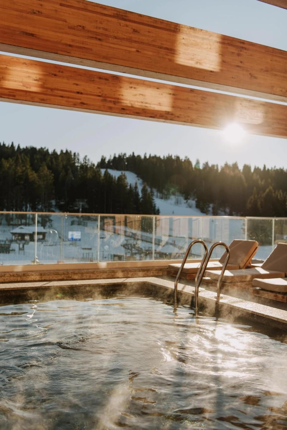 Sink into bubbling warmth as golden sunlight fills the sky.