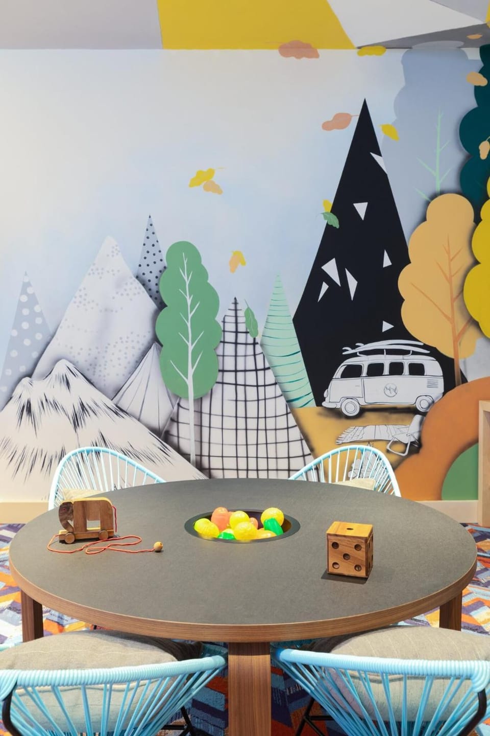 Gather for playful moments around the kids’ activity table.