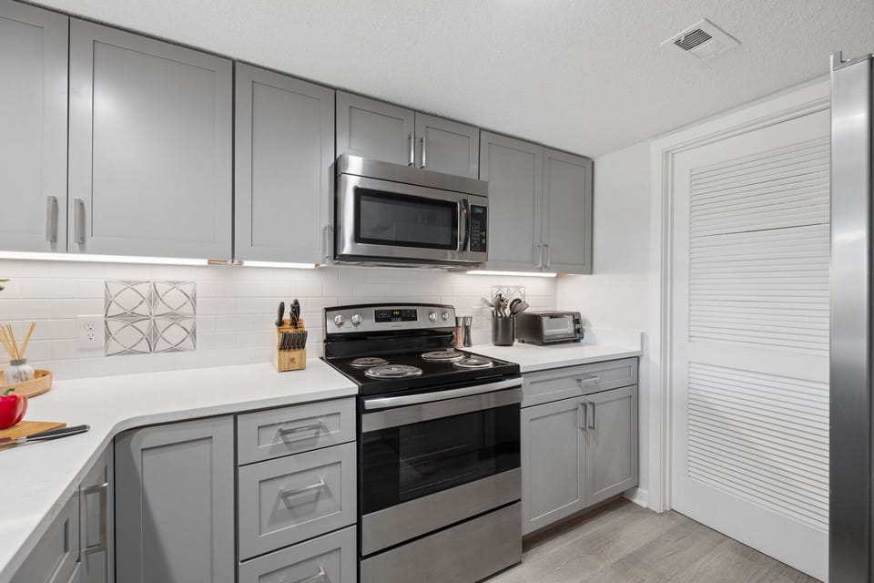 Kitchen with easy access to the laundry room