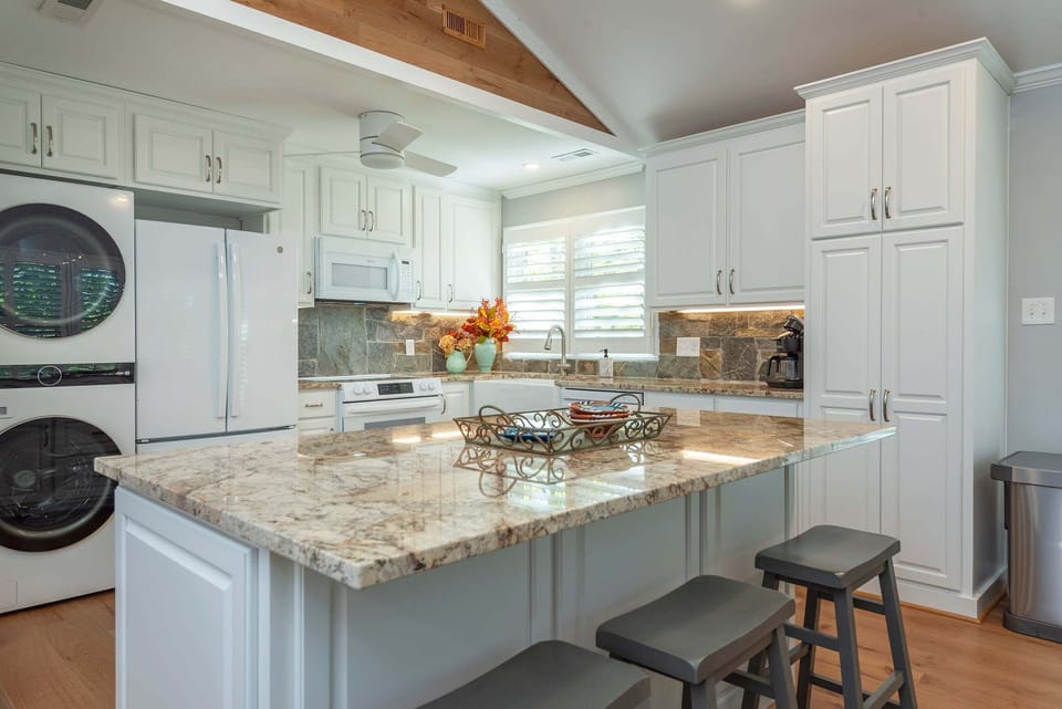 Stackable washer & dryer in the kitchen.