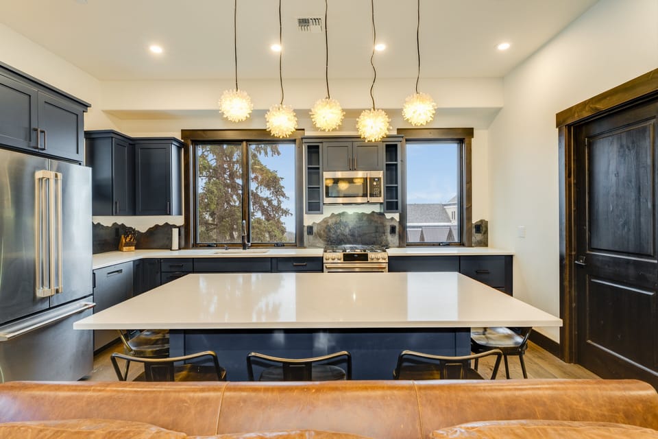 Kitchen with island seating. | Main Level