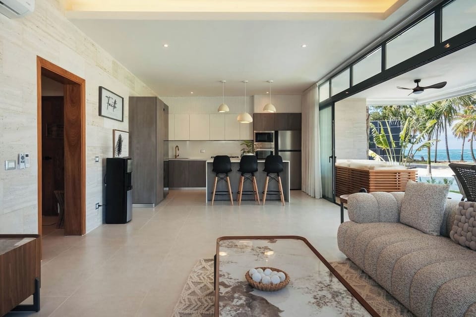 Enjoy a bright, open space that connects the living room, kitchen, and patio.