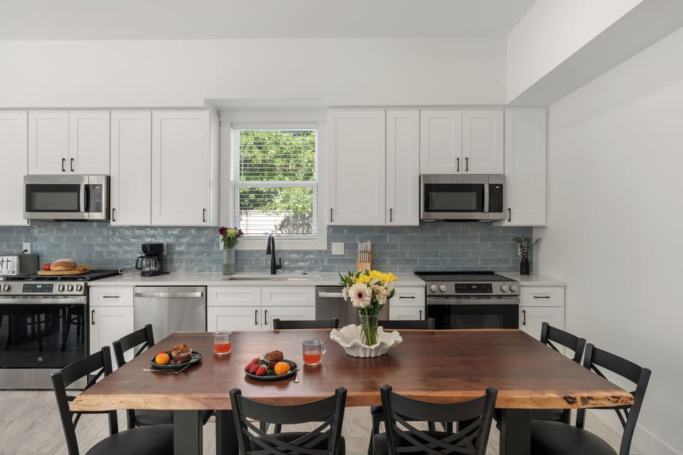 Kitchen prep space with a view of the dining area.
