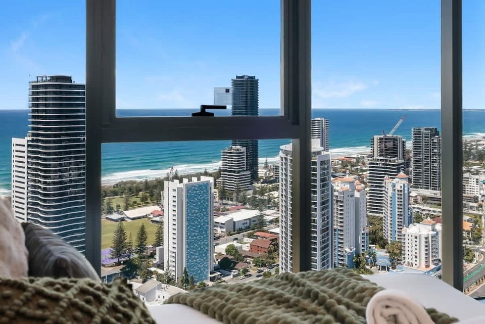 Master bedroom with stunning ocean & city view