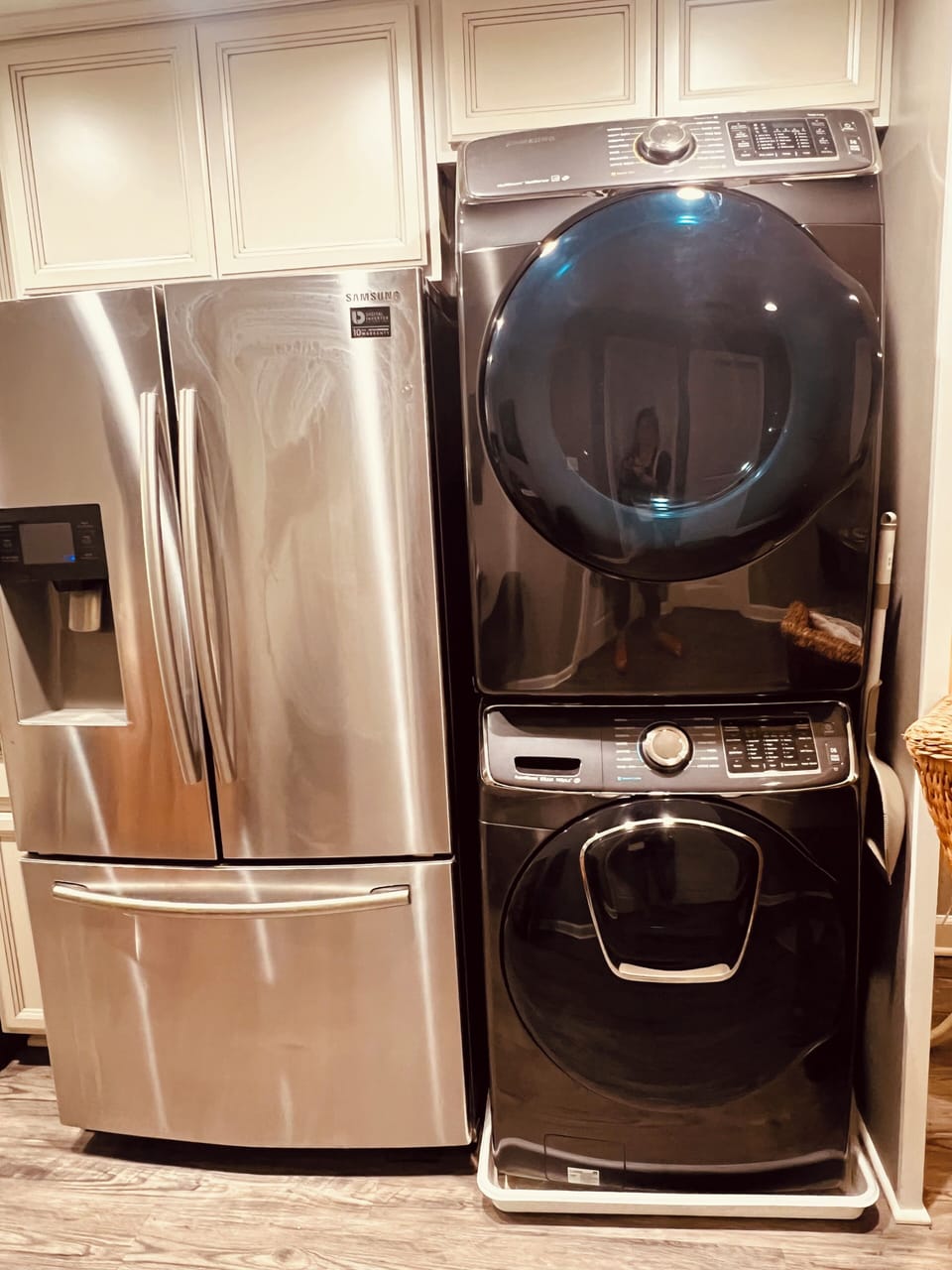 Front loader washer and dryer and stainless steel large fridge
