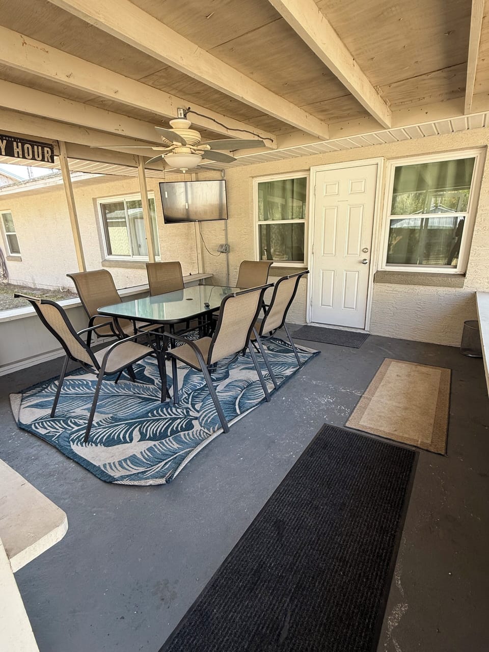 Screened-in dining area to enjoy the beautiful weather