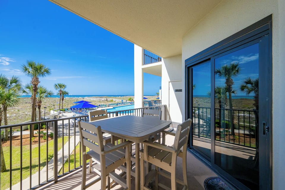 Enjoy morning coffee at your balcony table while taking in the lovely coastal views and vibrant surroundings