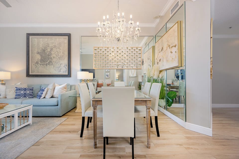 Dine with family around the elegant table while enjoying the bright vibe and stylish decor of this inviting space