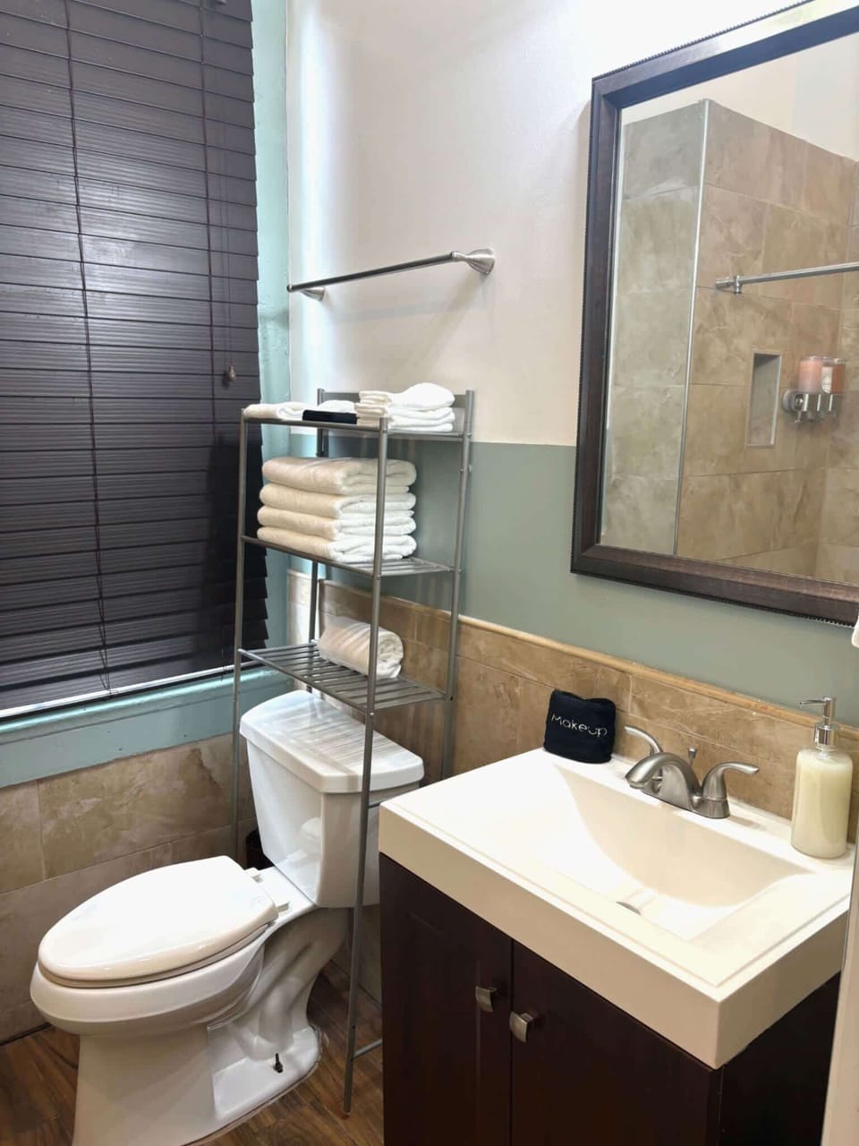 Full bathroom with vanity storage, updated fixtures, and everything needed for a comfortable stay.