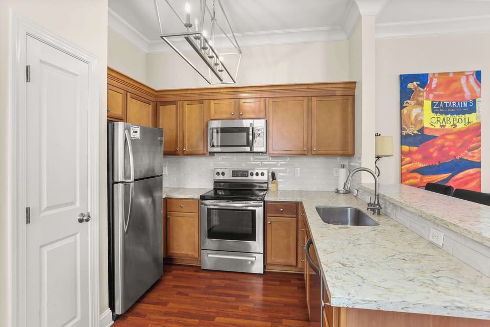 Fully equipped kitchen with ample counter space, ideal for cooking and hosting as a group.