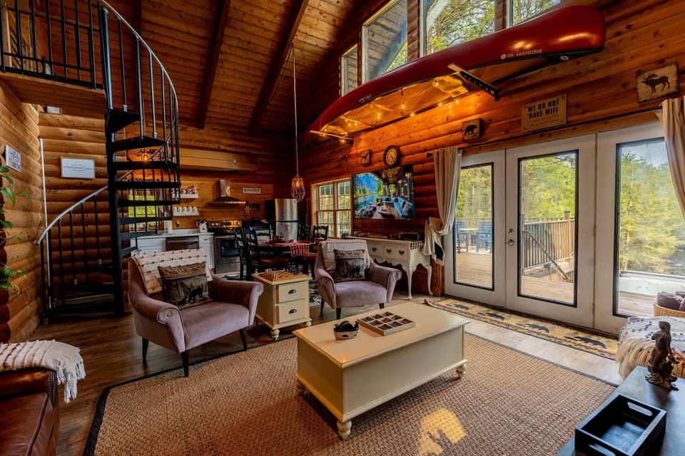 An inviting, open living room that flows seamlessly into the dining area and kitchen, allowing you to stay connected and engaged in every conversation.