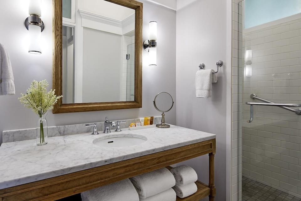 Indulge in marble-counter elegance as you get ready in comfort.