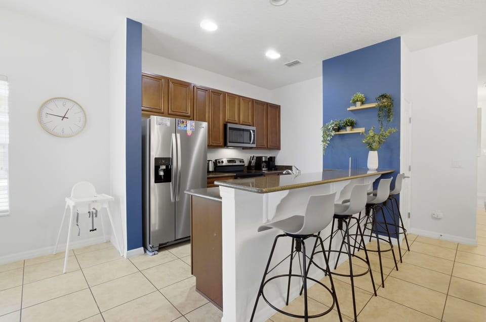 Breakfast bar seating for quick bites, morning coffee, or keeping the chef company.