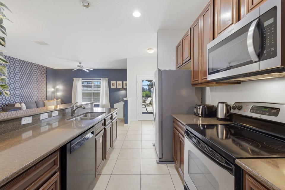 Modern, fully stocked kitchen with everything you need to cook, snack, and save on dining out.