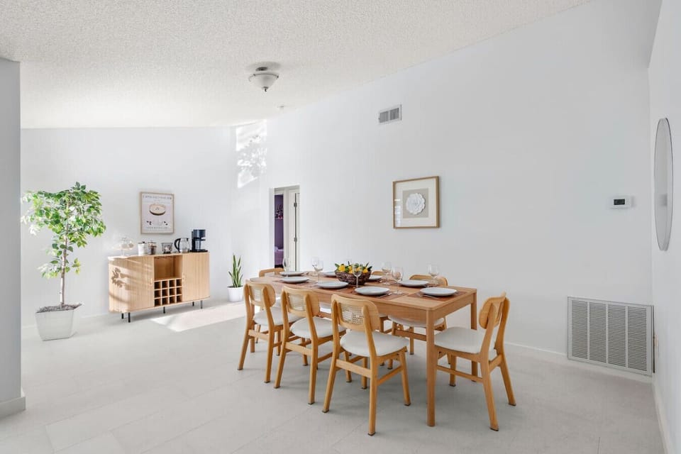 Big table energy — rattan style, seating for eight, and plenty of room for good food and better company.