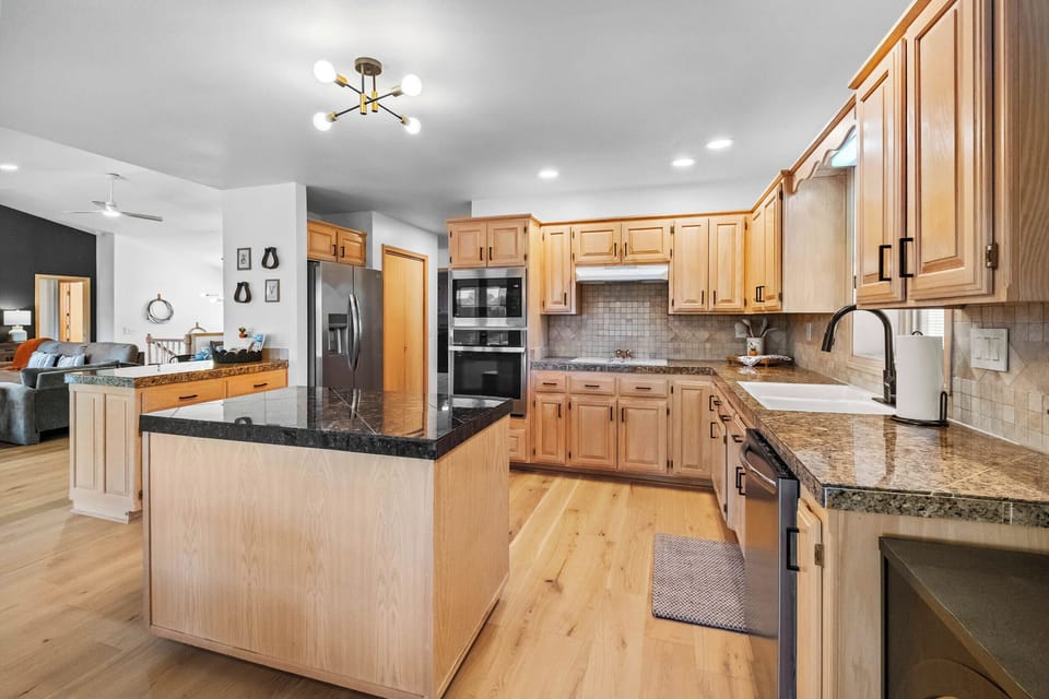 Fully stocked kitchen for all your cooking & baking needs! Pantry in hallway!