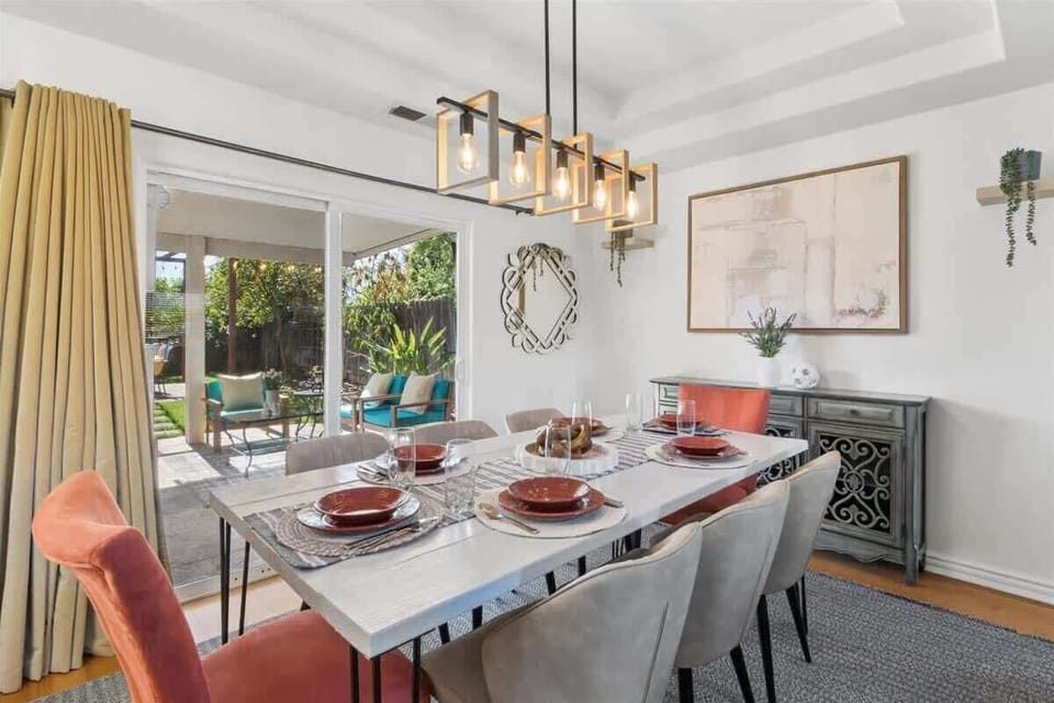 The indoor dining room table, which comfortably seats 8 and also has nearby additional seating for larger groups. 