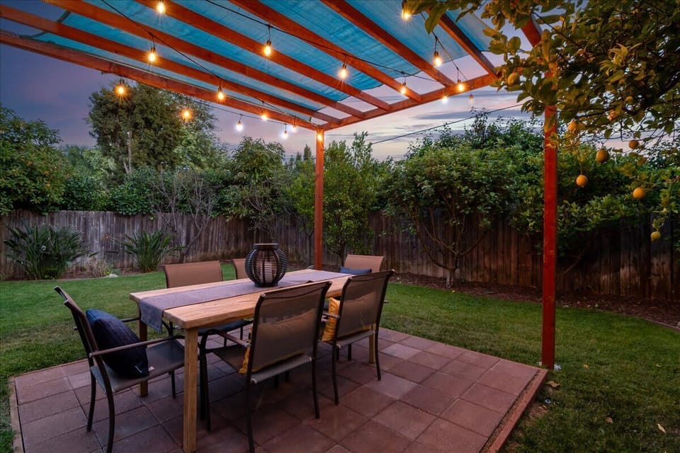 Enjoy your barbecue or favorite meal on the Elf fresco dining table under the cafe lights and laugh and enjoy the night away.