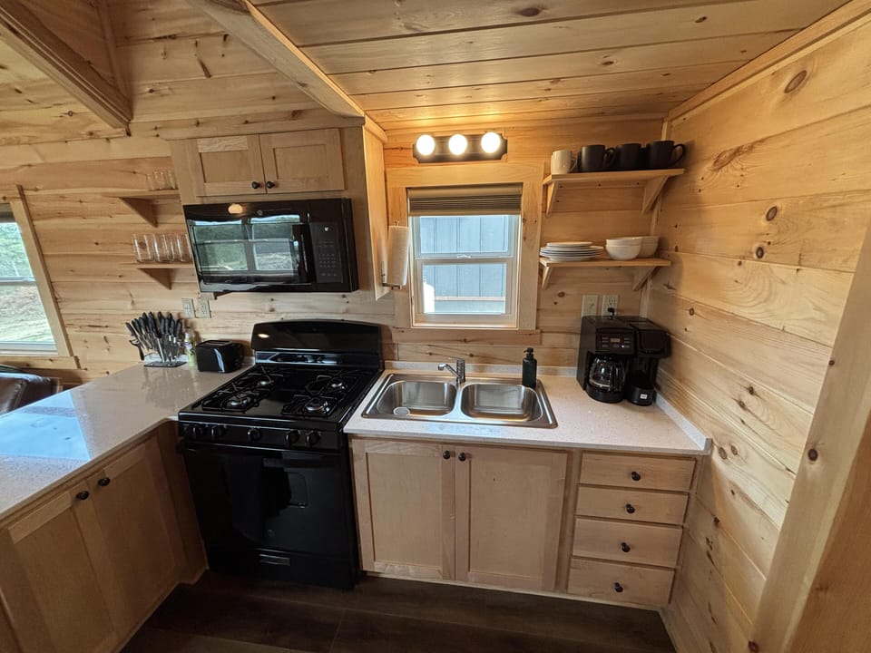 Cozy cabin kitchen with rustic charm and modern amenities