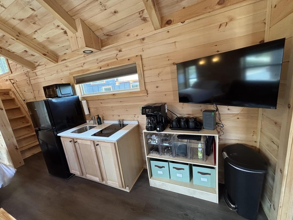 Cozy kitchenette with modern amenities and rustic charm