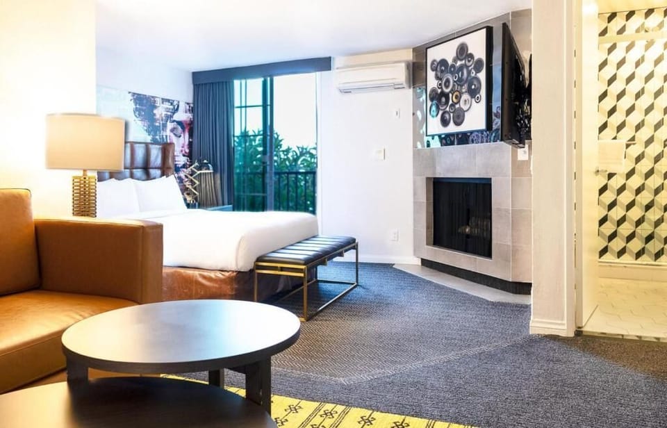 Stretch out in a spacious suite with cozy fireplace ambiance.