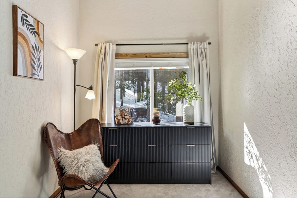 The primary bedroom features a king bed and an ensuite bathroom.