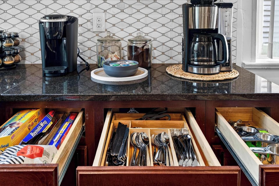 Kitchen: Bright and functional kitchen featuring updated appliances, generous counter space, and all the essentials you need. Ideal for cooking, dining, or enjoying a relaxed breakfast before heading out.
