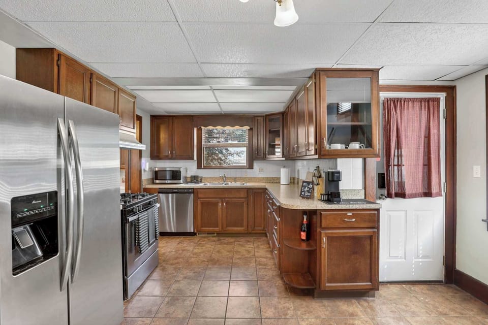 A fully equipped kitchen, perfect for preparing meals and gathering together.