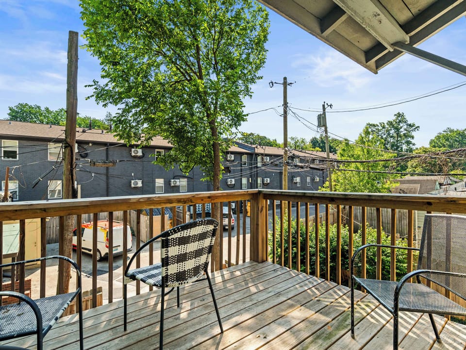 Porch: Start your mornings on the charming porch featuring comfortable seating and a relaxing setting perfect for coffee, conversations, or quiet moments outdoors.