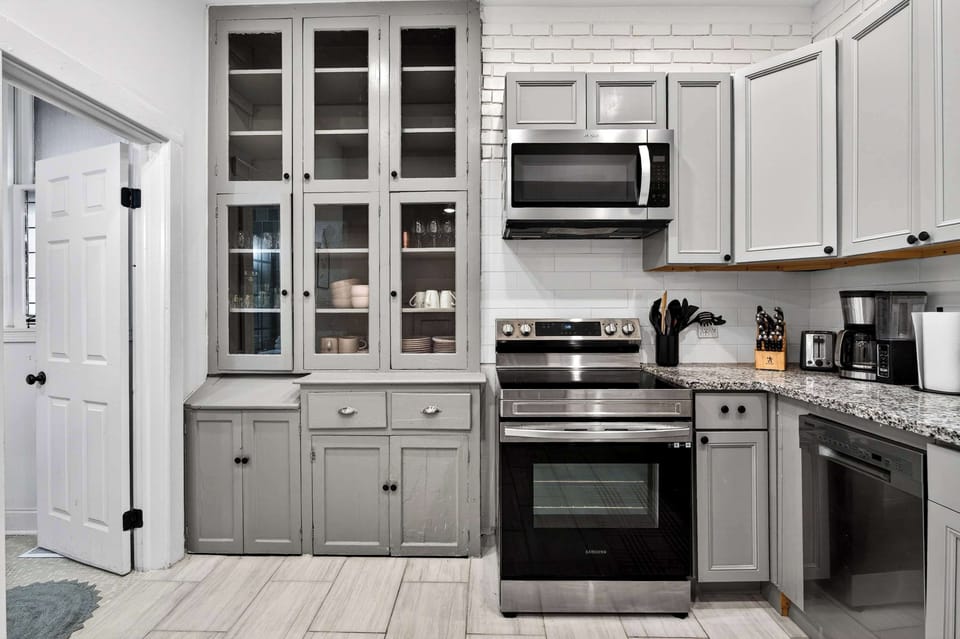 Kitchen: Fully loaded, fully stocked, fully ready for whoever's pretending to be the group chef.