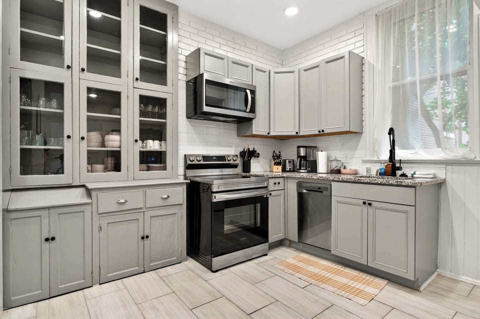 Kitchen: Fully loaded, fully stocked, fully ready for whoever's pretending to be the group chef.