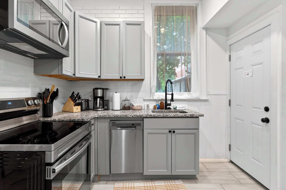 Kitchen: Fully loaded, fully stocked, fully ready for whoever's pretending to be the group chef.