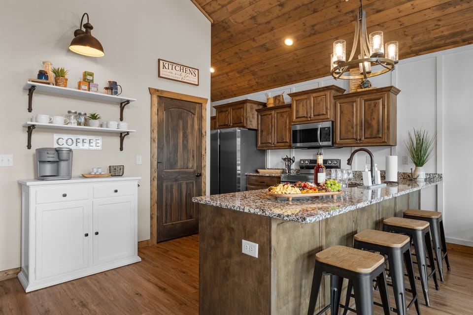 Fully stocked kitchen + coffee bar ☕🍳 — perfect for group meals, morning brews, and gathering around the island