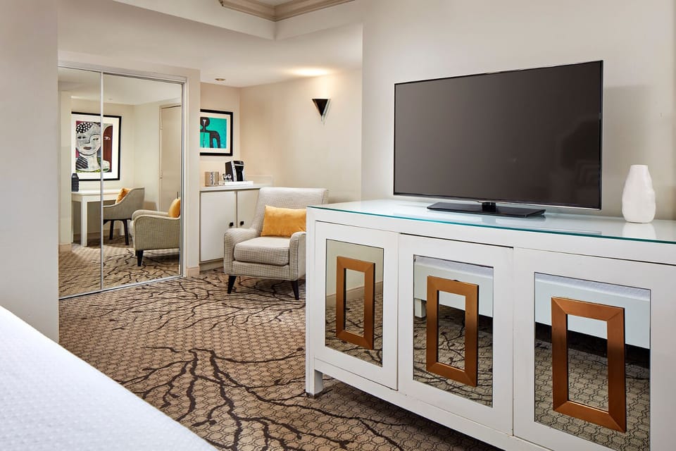 Unwind in a bright suite with lounge seating and HDTV