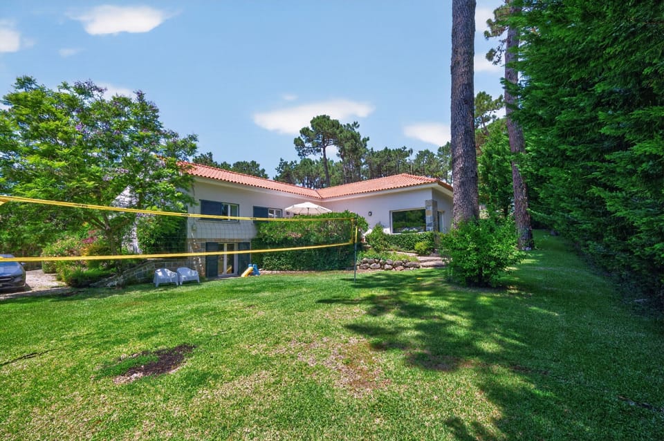 Expansive private garden — Villa Natura, holiday villa with fenced private pool in Colares, Sintra