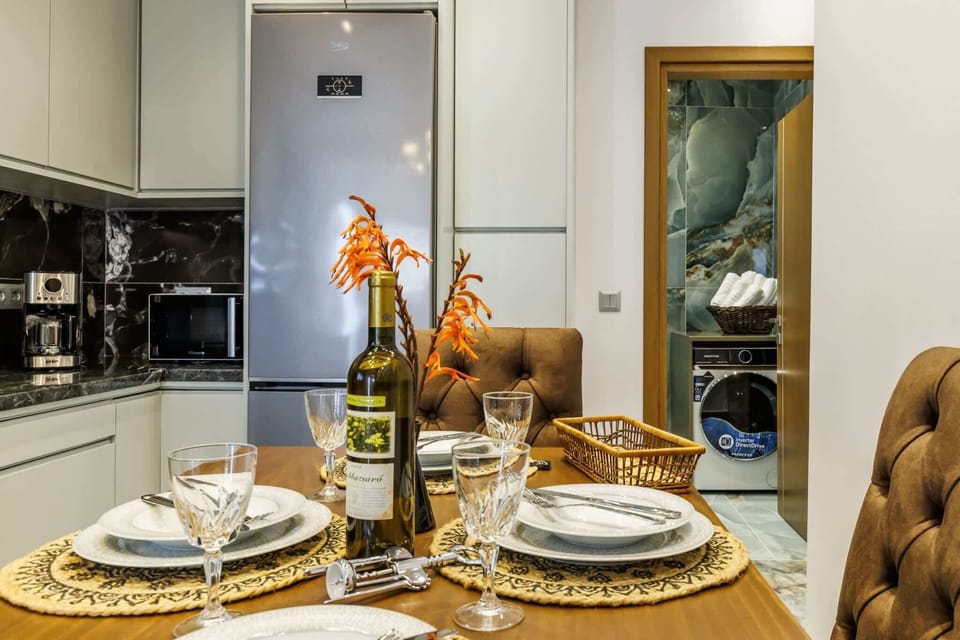 Fully equipped kitchen with ample space and modern appliances. Designed for convenience and ease during your stay