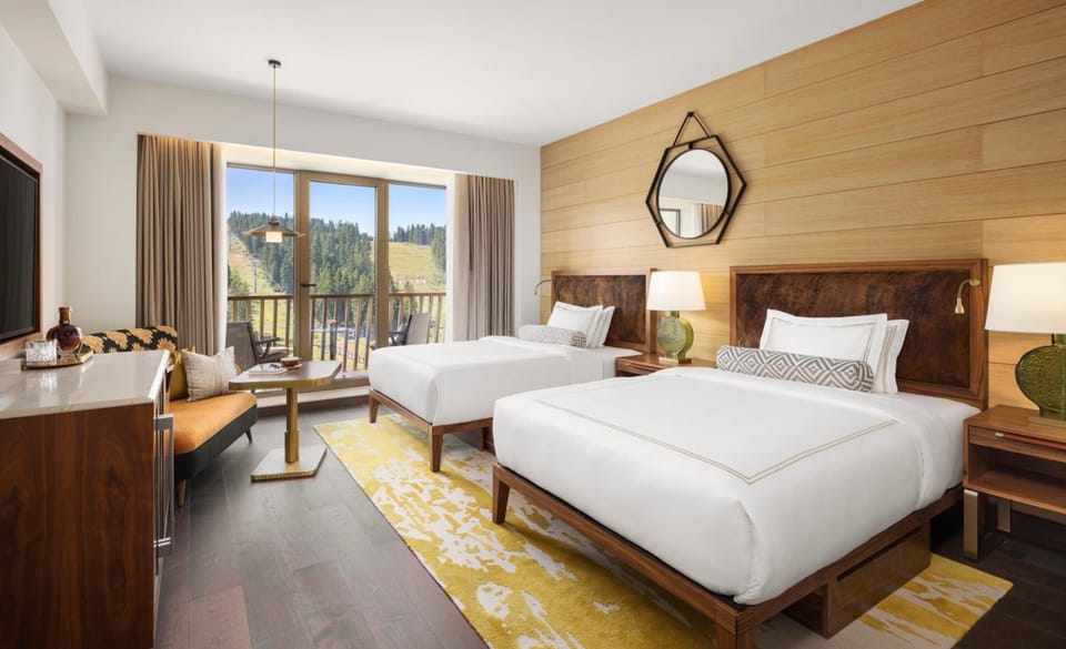 Spread out comfortably in a double-queen room with balcony views.