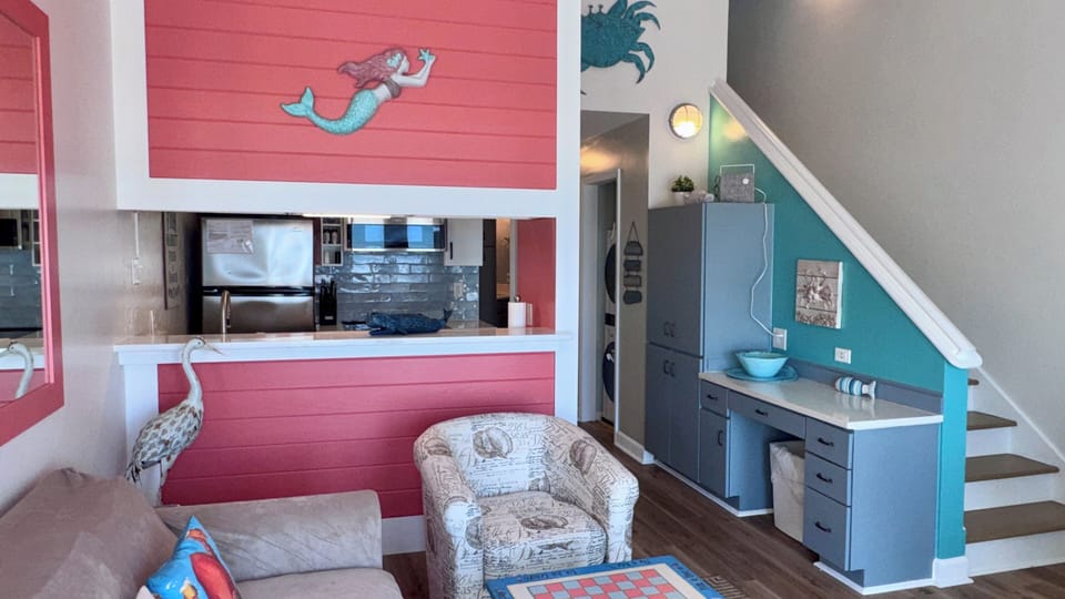 Living room - hallway leads to twin bunks and king bedroom. Stairs to queen bed.