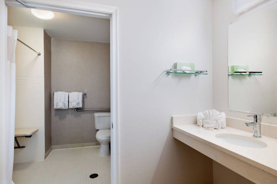 Refresh in a clean, bright bath with roomy walk-in shower.