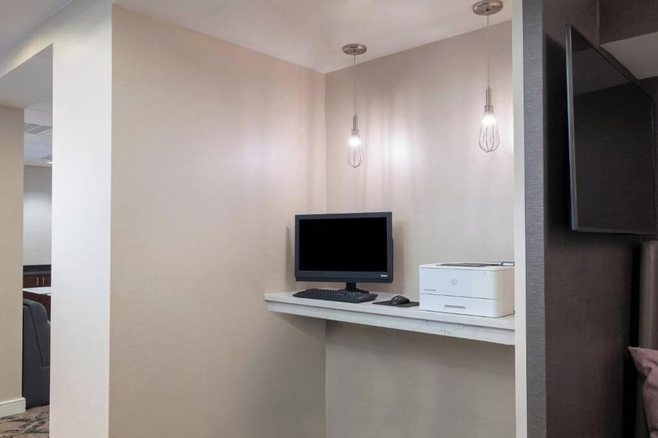 Stay productive with a quiet workspace for printing and planning.