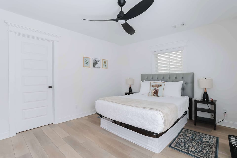 This spacious bedroom combines comfort and style to create the perfect retreat during your stay