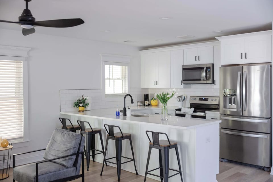 Featuring plenty of storage and workspace, this kitchen is designed to meet all your cooking needs during your stay