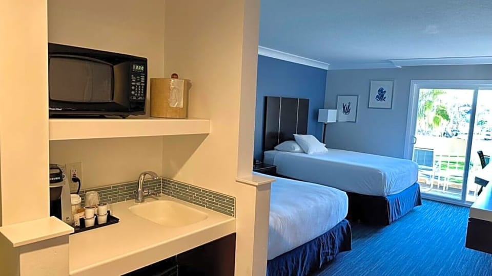 Start mornings with easy snacks and coffee in-room.