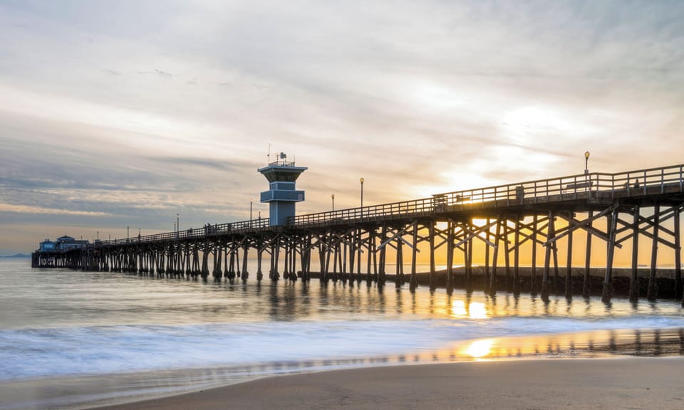 Stroll the pier at sunset and breathe ocean air.
